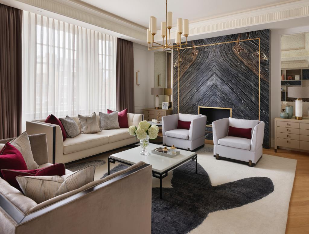 Elegant Mayfair reception room with marble feature wall at 51 South Street